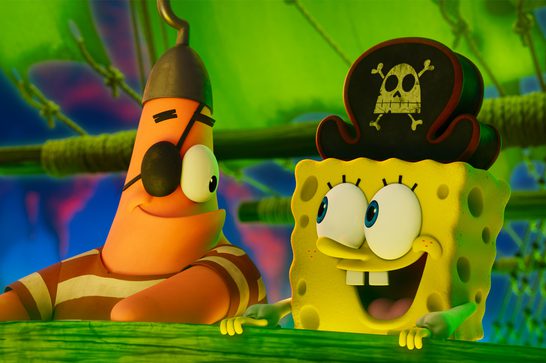 A smiling Spongebob looks to his right, a pirate hat on his head. Patrick the star fish stands next to him looking to his left and smiling. He's wearing an eye patch and a hook on his head. They are aboard the Flying Dutchman - a ghostly green ship that glows in the dark.