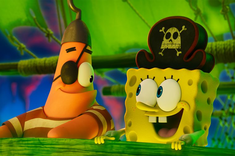 A smiling Spongebob looks to his right, a pirate hat on his head. Patrick the star fish stands next to him looking to his left and smiling. He's wearing an eye patch and a hook on his head. They are aboard the Flying Dutchman - a ghostly green ship that glows in the dark.