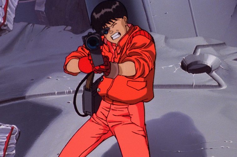 An animated character wearing a bright red jumpsuit and sunglasses aims a large firearm with a determined, gritted-teeth expression. The background shows a grey, rubble-strewn environment with cracked walls and industrial elements, suggesting a post-apocalyptic or battle-damaged setting. The art style is detailed hand-drawn animation typical of late 1980s Japanese anime.