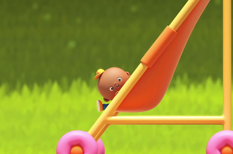 A colourful 3D animated scene showing a small, round-headed cartoon character with a tiny yellow cap and blue dungarees, clinging to the diagonal frame of a large orange and yellow pushchair or pram. The character peeks out with wide, curious eyes. The pushchair has bright pink wheels and sits against a vivid green grassy background.