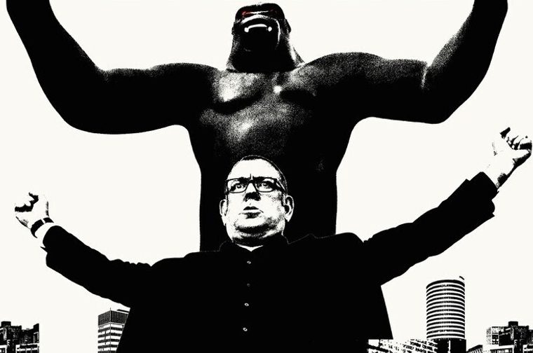 A high-contrast black-and-white poster-style illustration. A fiftysomething man in glasses and a dark suit stands in the foreground with both arms raised triumphantly, silhouetted against a stylized city skyline of towers and apartment blocks. Behind and above him looms a giant gorilla, also with its arms raised in the same pose, its posture mirroring the man's. The gorilla's eyes glow red, the only spot of color in the otherwise monochrome image.