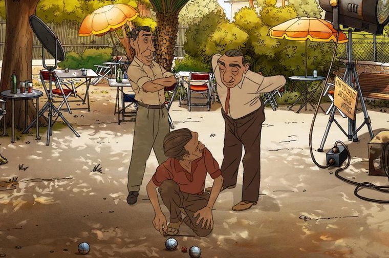 A charming animated illustration depicting a pétanque (boules) scene in what appears to be a sunny South of France setting. Three men are gathered around the metal balls on a dusty court — one crouching to inspect the positions of the boules, while the other two look on with expressions of concentration or mild dismay. The scene has a lovely film shoot backdrop: there's a movie light on a tripod, a sign in French reading "On tourne" (meaning "We're filming" or "Action!"), director's chairs, and orange parasols.