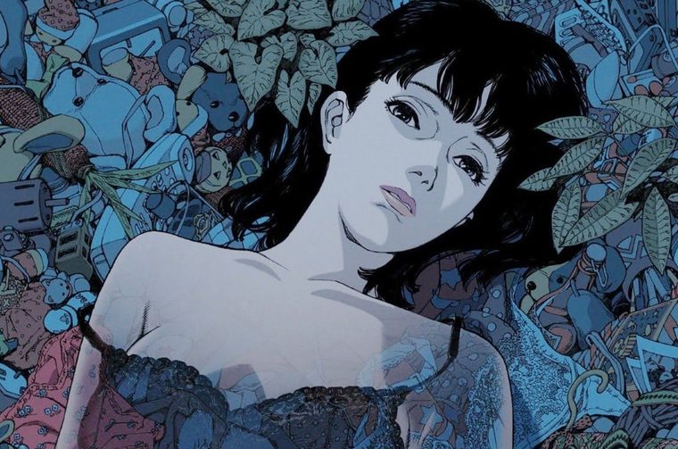 A scene from the animated film 'Perfect Blue' showing a young woman with short black hair and pale skin lying among a chaotic collage of colourful foliage. She appears to be resting or reclining, surrounded by a dense array of items in various shades of blue, pink, and other colours that create a surreal, dreamlike background. The objects appear to include toys, everyday items, and various merchandise, all rendered in a detailed, cluttered composition. The art style is characteristic of director Satoshi Kon's psychological thriller, with the overwhelming visual density of the background creating an unsettling, disorienting atmosphere that reflects the film's themes of identity and reality.