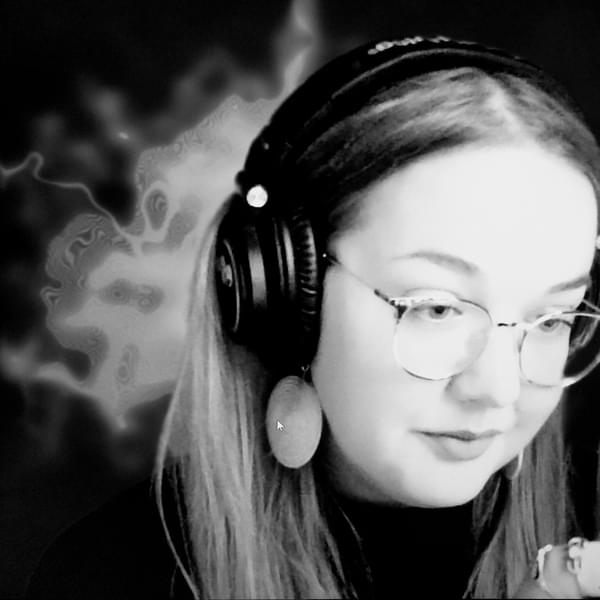 Black and white photography of Allie Litherland - wearing classes, large circular earrings and headphones