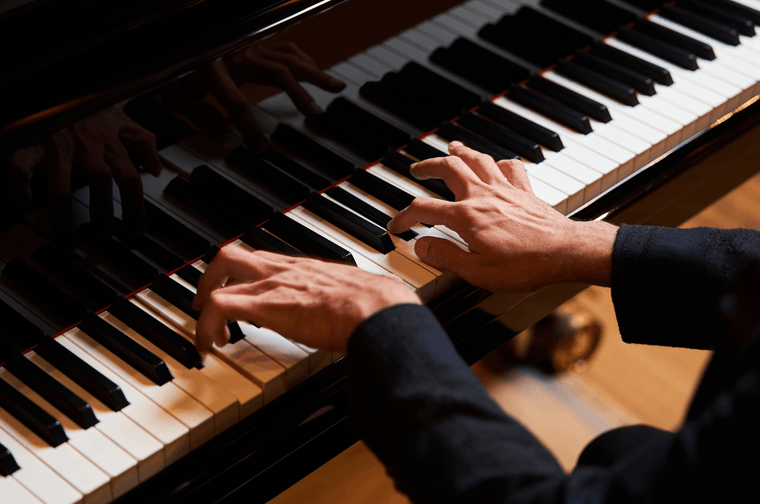 A person is playing the piano