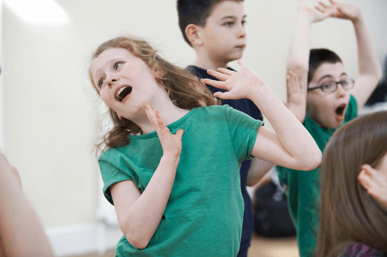 Children are using their hands to make an shocked expression