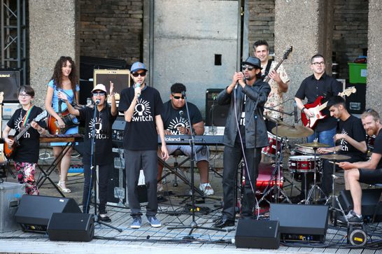 SWITCH band performing a live gig outside
