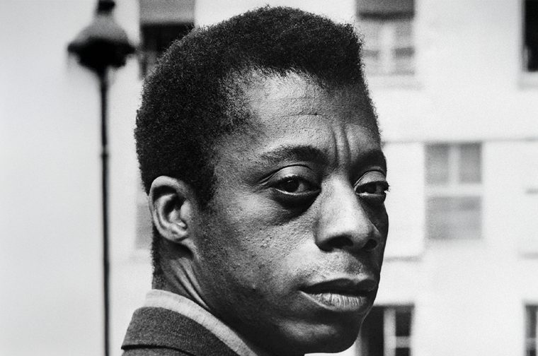 Black and white photograph of James Baldwin. close up of his face