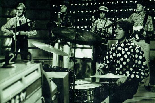 Black and white shot of 60s band Pinkerton's Assorted Colours performing in a TV studio.